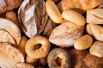 Fototapeta na wymiar various types of fresh bread, top view