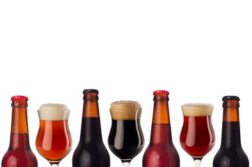 Decorative art border of beer in bottles and wineglass with foam - lager, red ale, porter -  isolated on white background. Concept for brewing industry, design for branding, menu, company.