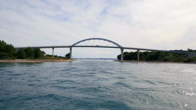 Going towards bridge called Zdrelac between islands Pasman and Ugljan in Croatia. Filmed on sailing tip in Adriatic sea in slow motion hd.