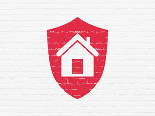 Finance concept: Painted red Shield icon on White Brick wall background