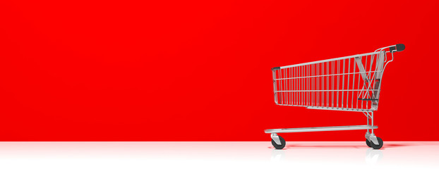 Shopping trolley empty, on red wall background, banner, copy space. 3d illustration © Rawf8