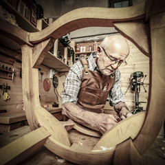 Fototapeta na wymiar carpenter at work in workshop