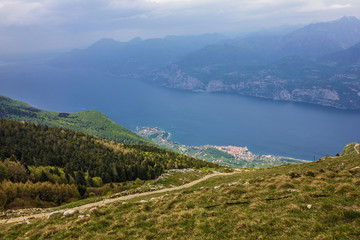 Fototapeta na wymiar Italy, Malcesine. Garda lake panorama. Monte Baldo mountain