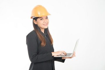 Asian engineer woman working hard on notebook