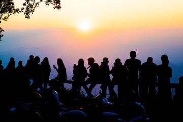 People on top of mountain