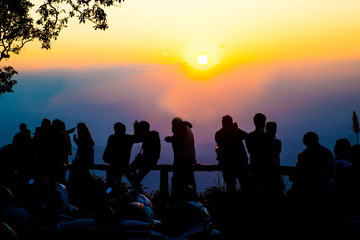 People on top of mountain