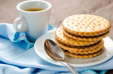 cup of coffee with biscuits