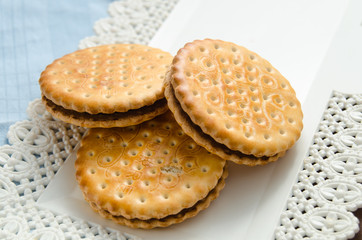 cup of coffee with biscuits