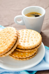 Fototapeta na wymiar cup of coffee with biscuits