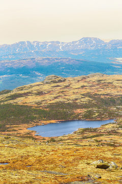 Mountains over the valley Innerdalen, rennebu district, Norway. aerial view of the lake Groentjenna.
