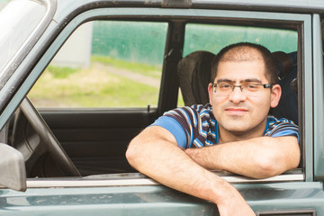 man sitting in the car