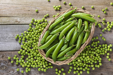 Fresh peas and pea grains in a basket
