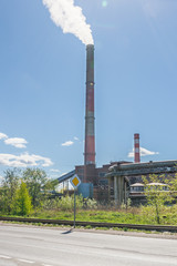Industrial power plant chimney. Ecology