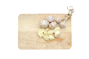 garlic on Wooden cutting board isolated on white background