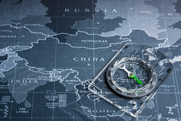 Compass on the world map.Business travel world wide system concept.