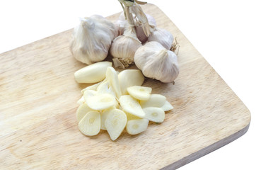 garlic on Wooden cutting board isolated on white background