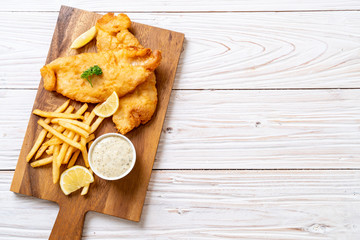 fish and chips with french fries - obrazy, fototapety, plakaty