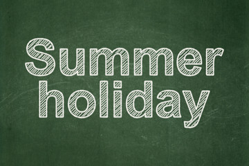 Obraz premium Travel concept: text Summer Holiday on Green chalkboard background