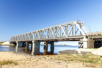 railway bridge over the river on a Sunny day