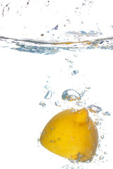lemon in water with bubbles