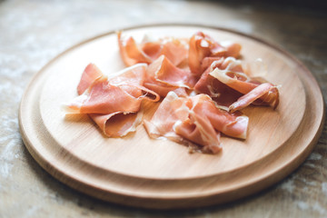 Jamon on wooden background