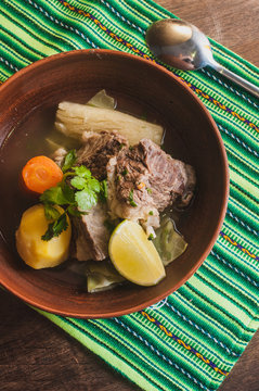 Delicious peruvian soup sancochado shot from above