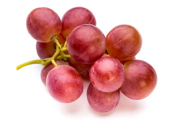 Ripe red grape isolated on white.