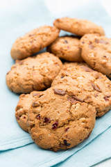 Chocolate oatmeal cookies on the  wooden background.