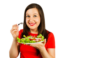 Young woman with excess weight eat salad, isolated on white background.