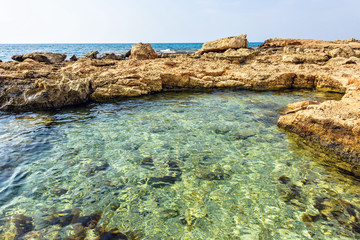 Daylight view to Nissi Beach with colorful bright blue water and sky