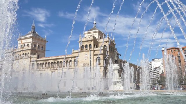 Fountain pouring water - Plaza Zorrilla Academia de Caballer&iacute;a,Valladolid, Spain