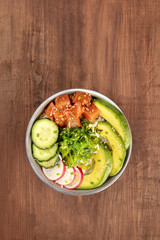 Hawaiian tuna poke salad with wakame and copy space