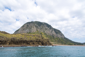 Fototapeta na wymiar Sanbang Mountain and ocean in Jeju Island, South Korea.
