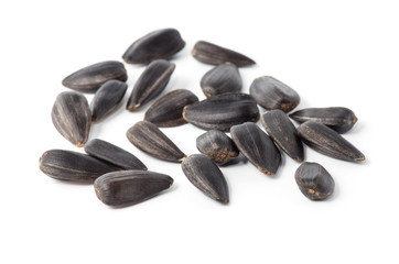 Sunflower seeds isolated on white background close up