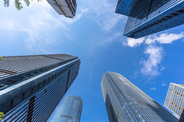Fototapeta na wymiar up view of modern office building in hongkong china