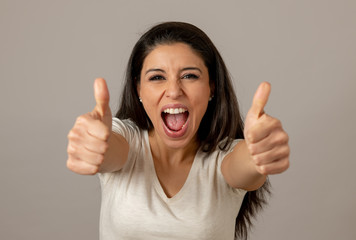 Happy excited and euphoric attractive young woman celebrating money win and success