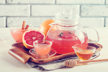 Grapefruit herbal tea with ginger and honey