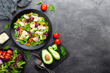 Salad with fish. Fresh vegetable salad with salmon fish fillet. Fish salad with salmon fillet and...