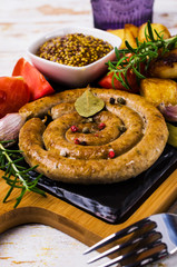 Fried round sausages