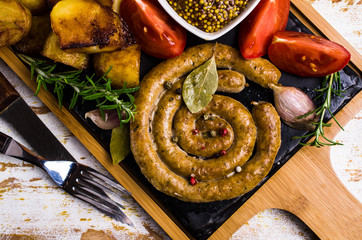 Fried round sausages