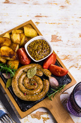 Fried round sausages