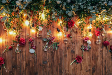 Rustic wedding photo zone. Hand made wedding decorations includes Photo Booth  red flowers....