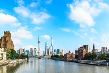Fototapeta premium Beautiful Shanghai skyline at sunset,modern urban background