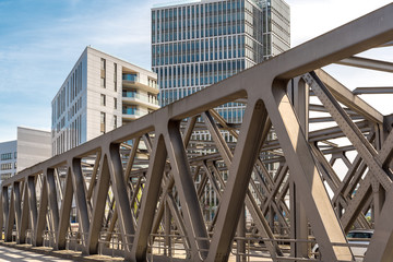 The Magdeburger bridge is a truss bridge crossing a watercourse in the new Hafencity of Hamburg