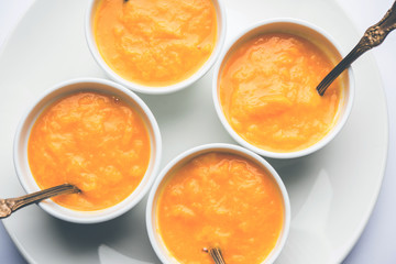 Mango Pulp / Aam rus or Ras served in small bowls, selective focus