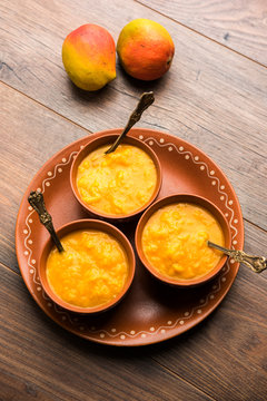 Mango Pulp / Aam rus or Ras served in small bowls, selective focus