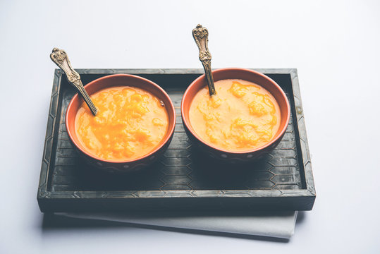 Mango Pulp / Aam rus or Ras served in small bowls, selective focus