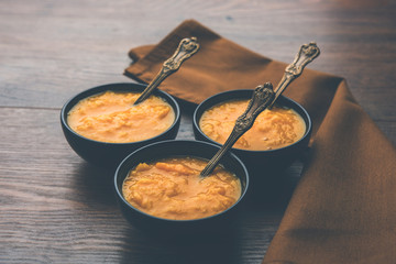 Mango Pulp / Aam rus or Ras served in small bowls, selective focus