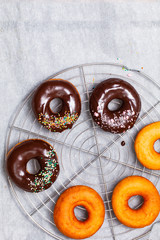 Food Concept Homemade donuts chocolate and colorful sparkling sugar topping