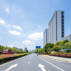 modern office building with empty street infront